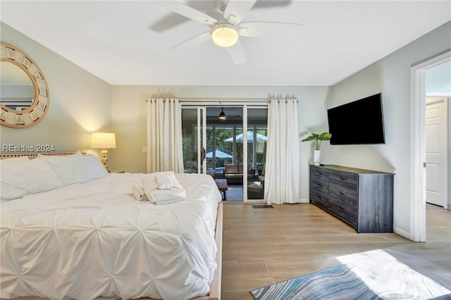 bedroom featuring light wood-type flooring, access to exterior, and ceiling fan