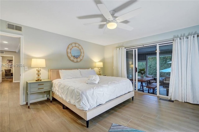 bedroom featuring access to outside, light hardwood / wood-style floors, and ceiling fan