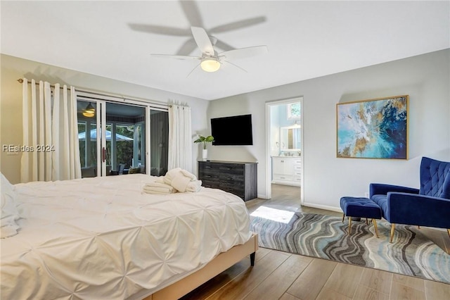 bedroom with connected bathroom, hardwood / wood-style flooring, ceiling fan, access to exterior, and multiple windows