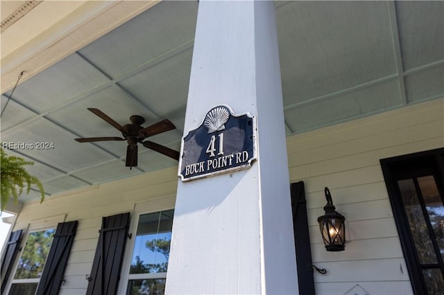 exterior details featuring ceiling fan