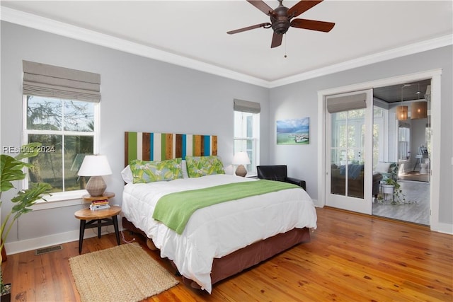 bedroom featuring wood-type flooring, crown molding, access to outside, and ceiling fan