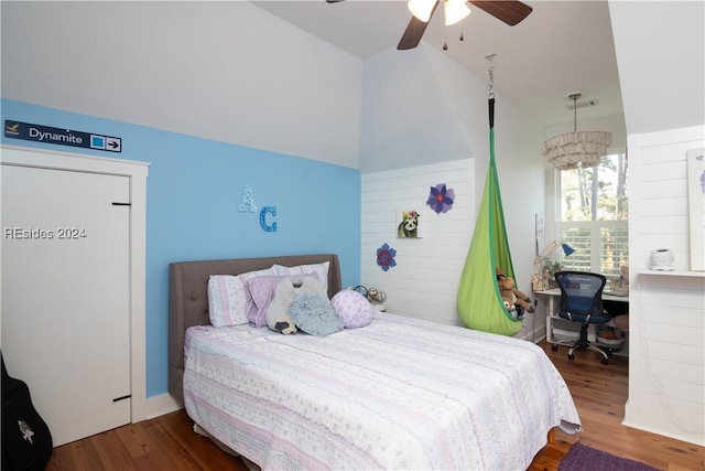 bedroom featuring wood-type flooring, ceiling fan, and vaulted ceiling