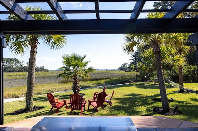 view of patio / terrace featuring a rural view and a pergola