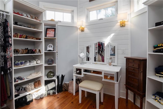 spacious closet featuring hardwood / wood-style flooring