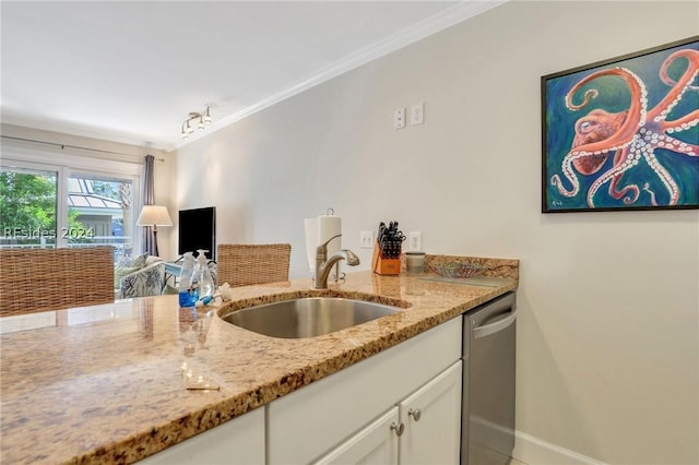 kitchen featuring dishwasher, sink, white cabinets, ornamental molding, and light stone countertops