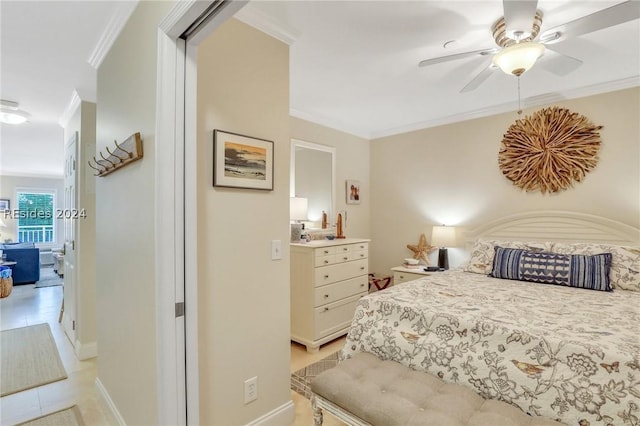 tiled bedroom with crown molding and ceiling fan