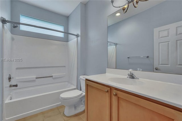 full bathroom featuring tile patterned flooring, vanity, toilet, and  shower combination