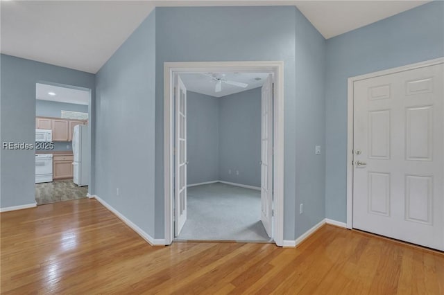 foyer with light hardwood / wood-style floors