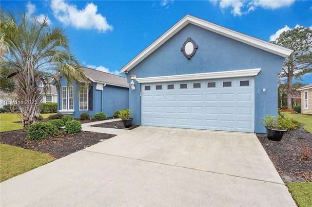 ranch-style home with a garage