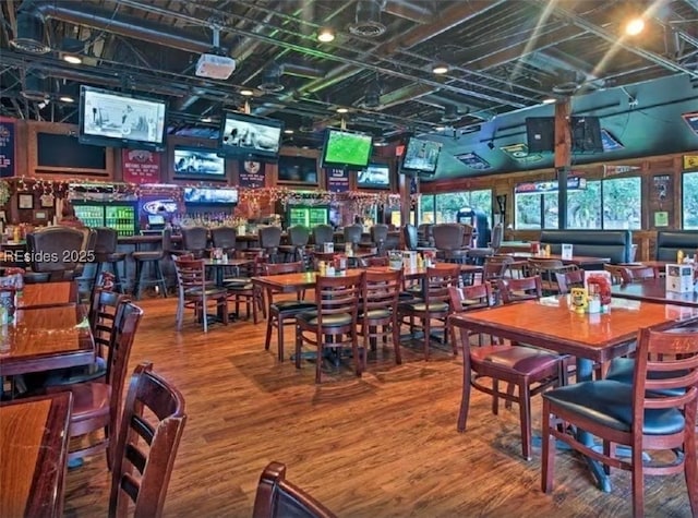 dining area with wood-type flooring