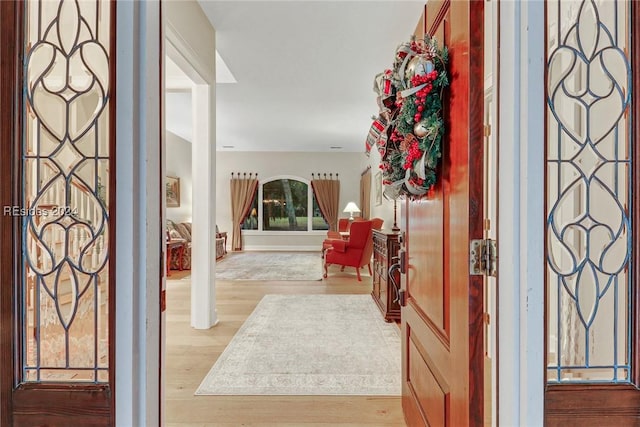 entrance foyer with light hardwood / wood-style flooring