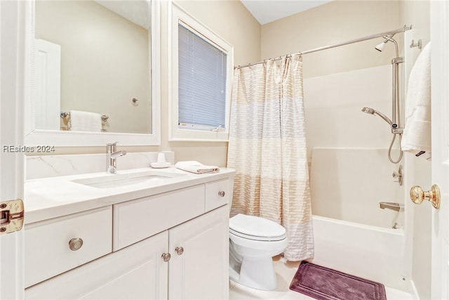 full bathroom with vanity, toilet, and shower / tub combo with curtain