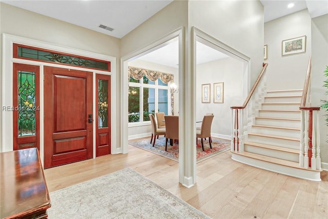 foyer with light wood-type flooring