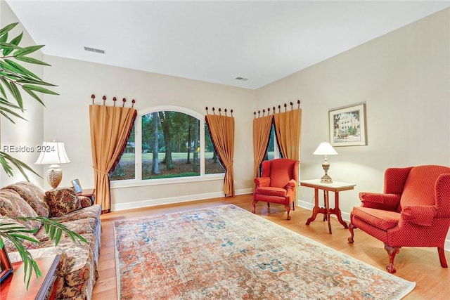 sitting room with light wood-type flooring