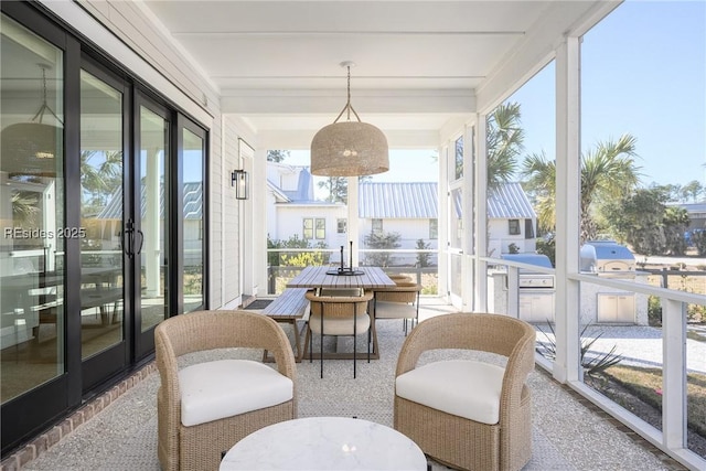 sunroom / solarium with a healthy amount of sunlight