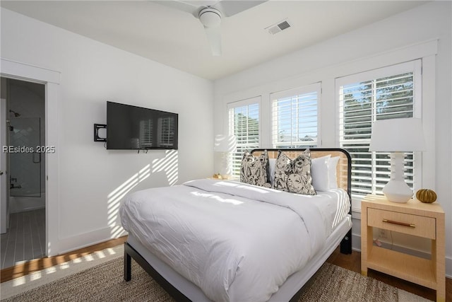 bedroom with wood-type flooring and ceiling fan