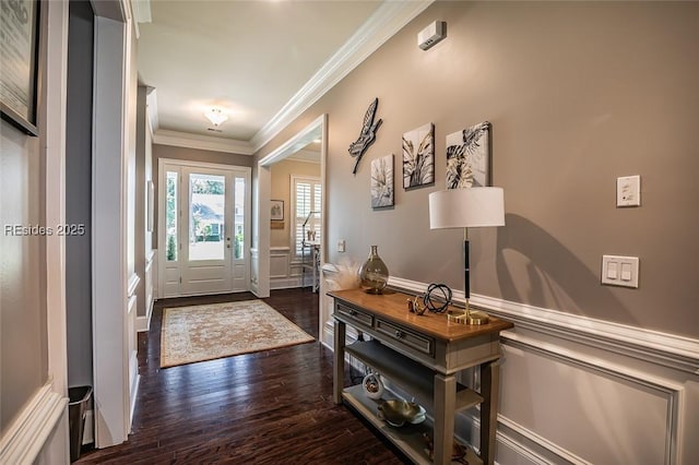 entryway featuring crown molding and dark wood-type flooring