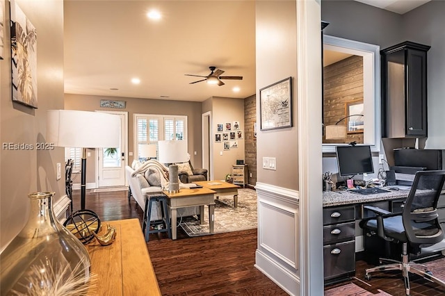 office area with dark hardwood / wood-style floors and ceiling fan