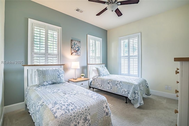 carpeted bedroom featuring ceiling fan