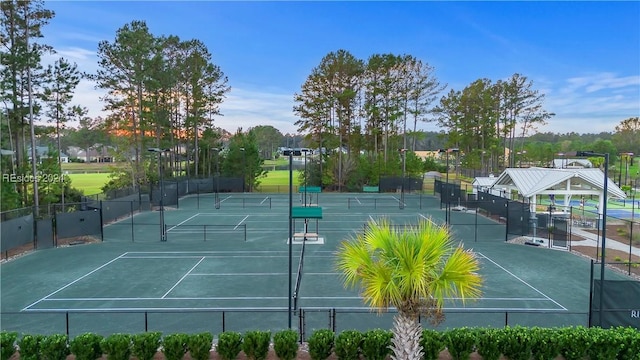 view of tennis court with a gazebo