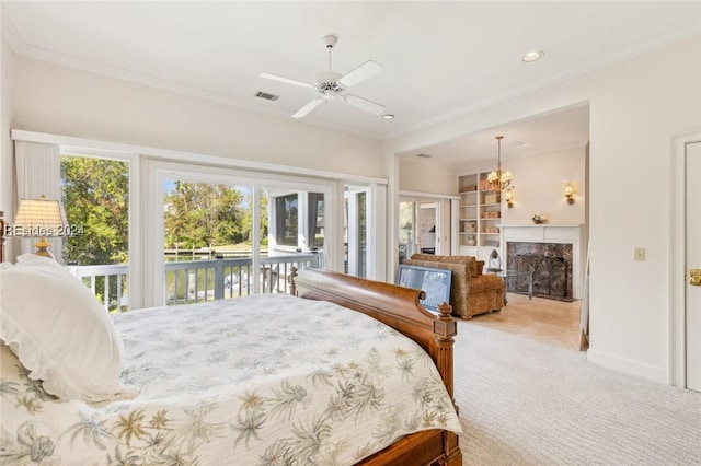 carpeted bedroom with multiple windows, access to exterior, crown molding, and ceiling fan