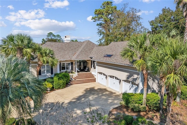 view of front of home with a garage