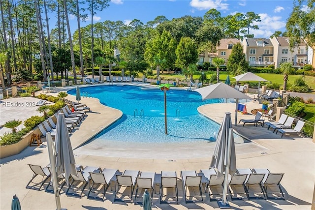 view of swimming pool featuring a patio