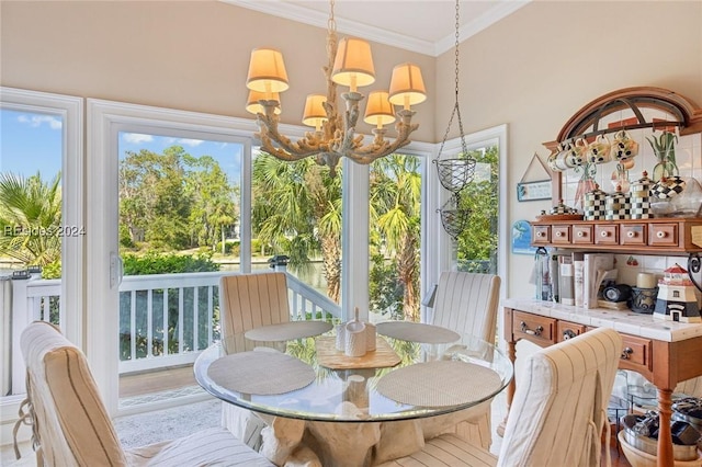 sunroom / solarium with a notable chandelier and a healthy amount of sunlight