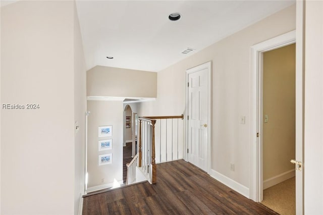 hall featuring dark wood-type flooring