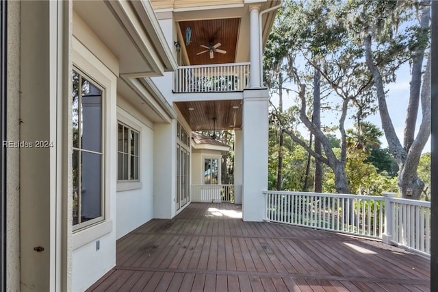 wooden deck with ceiling fan