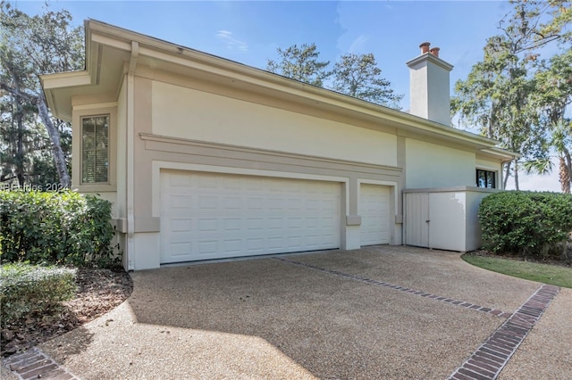 view of property exterior featuring a garage