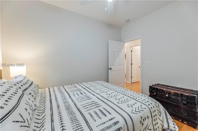 bedroom featuring light hardwood / wood-style flooring and ceiling fan