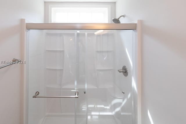 bathroom with walk in shower