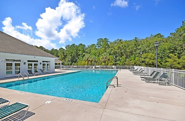 view of swimming pool featuring a patio