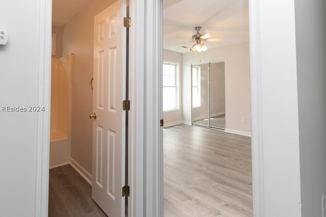 corridor featuring light wood-type flooring