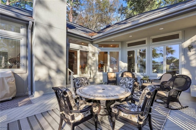 wooden terrace with grilling area