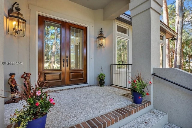 property entrance featuring french doors