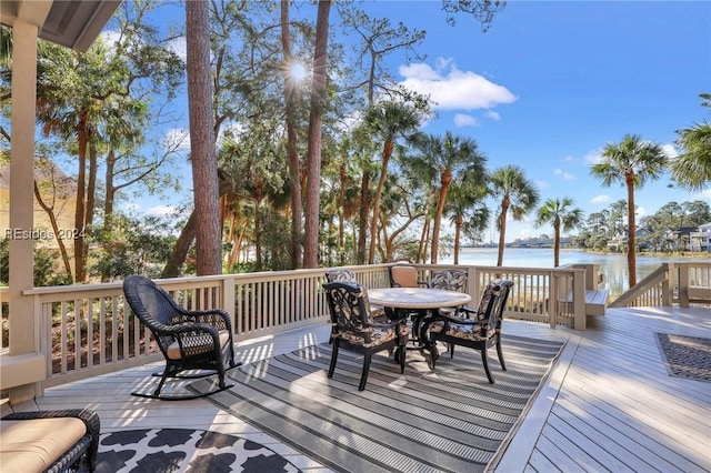 deck featuring a water view