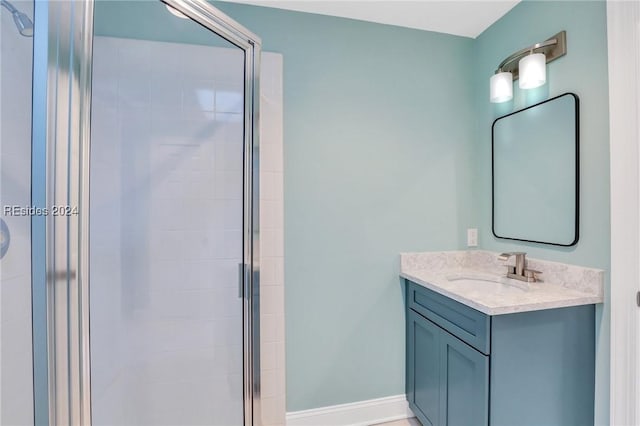 bathroom with vanity and walk in shower