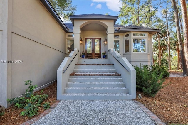 entrance to property featuring french doors