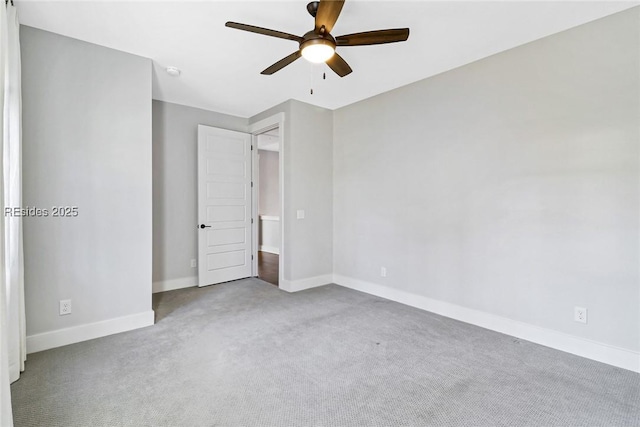 unfurnished bedroom featuring light carpet and ceiling fan