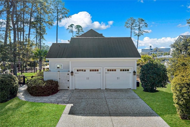 garage with a lawn