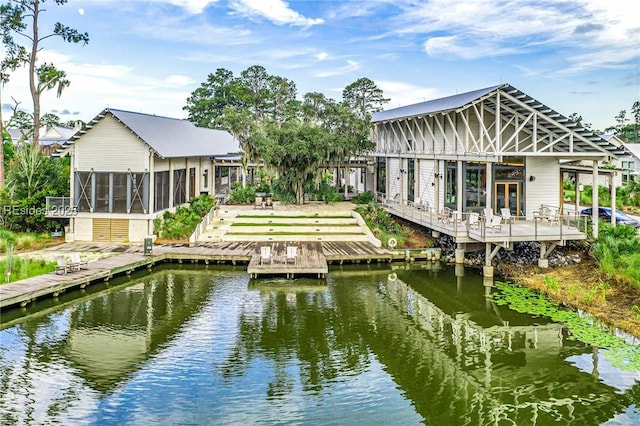 dock area with a water view