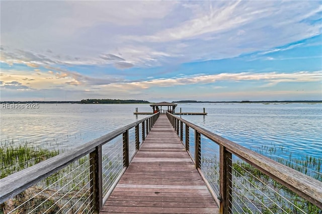 view of dock with a water view