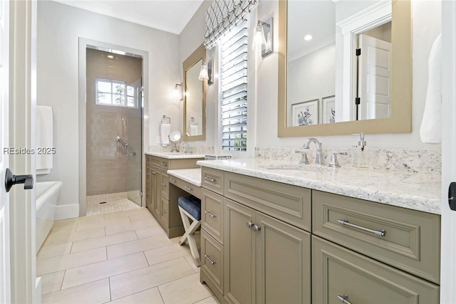 bathroom featuring vanity, tile patterned flooring, and a tile shower