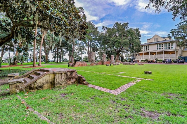 view of community featuring a lawn