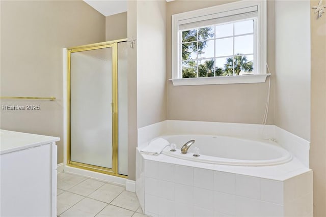 bathroom featuring separate shower and tub and tile patterned floors