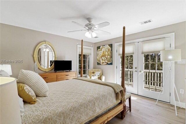 bedroom featuring french doors, ceiling fan, hardwood / wood-style flooring, and access to outside