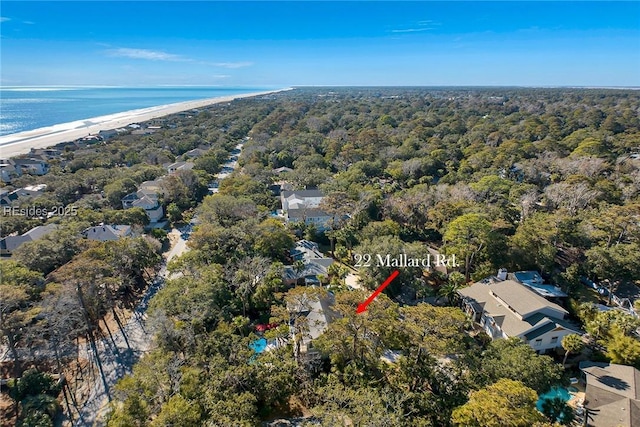 bird's eye view with a water view and a view of the beach