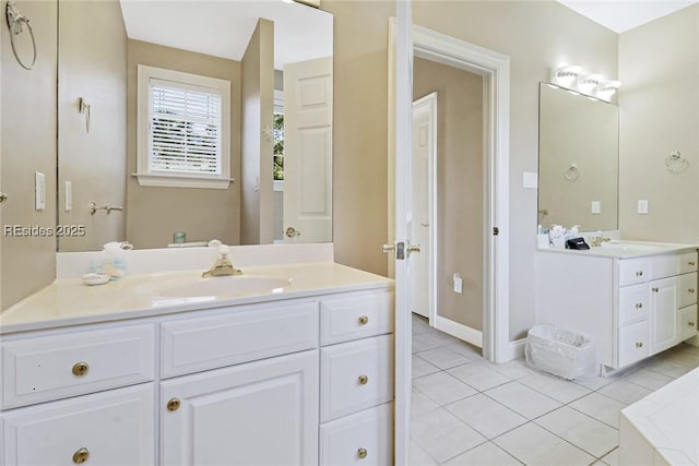 bathroom featuring vanity and tile patterned flooring